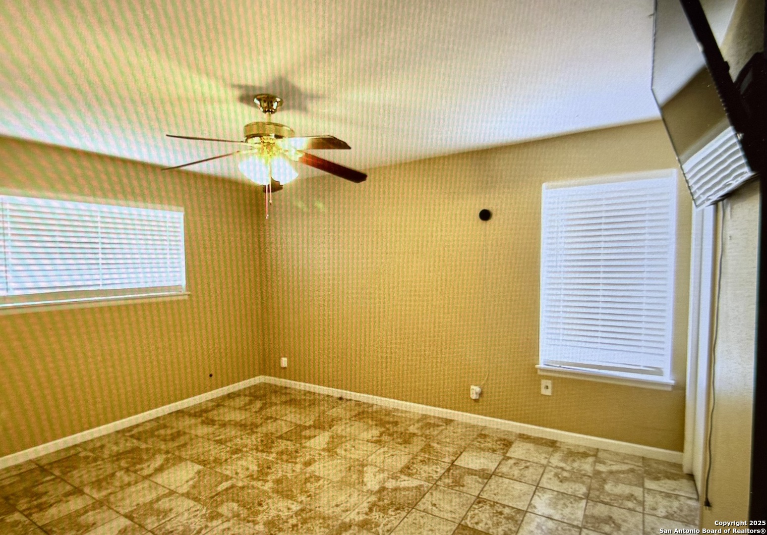 315 Mockingbird Lane Devine, TX 78016 - Photo 6 of 13 a view of a room with natural light