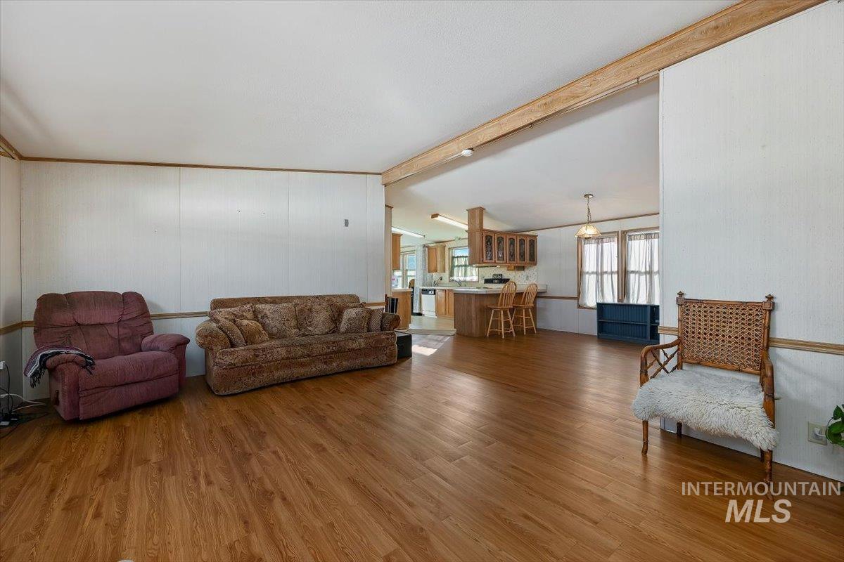 198 South Hills Road, Unit 142 Twin Falls, ID 83301 - Photo 3 of 27 Living area with wood finished floors