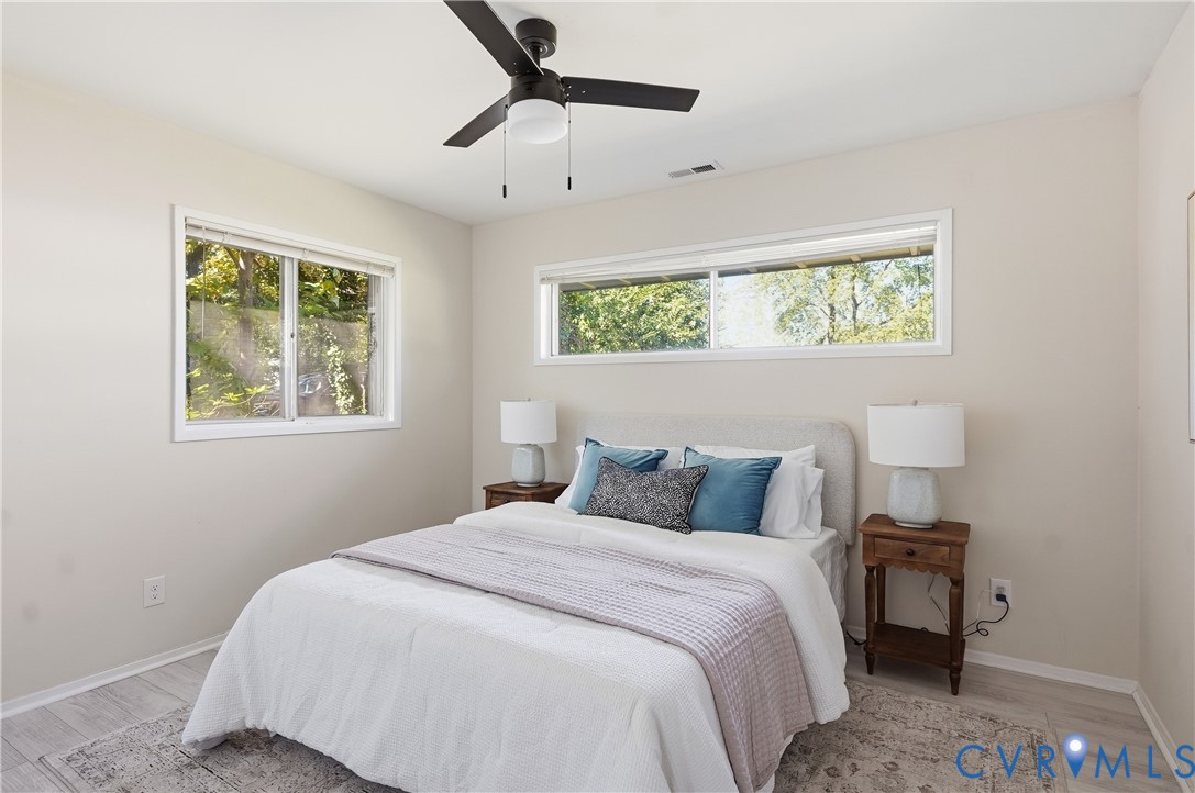 9207 Mapleway Road Richmond, VA 23229 - Photo 24 of 36 Recessed lighting, wood-finish flooring, two large