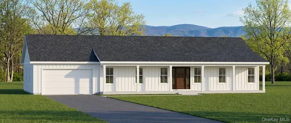 a view of house with a yard