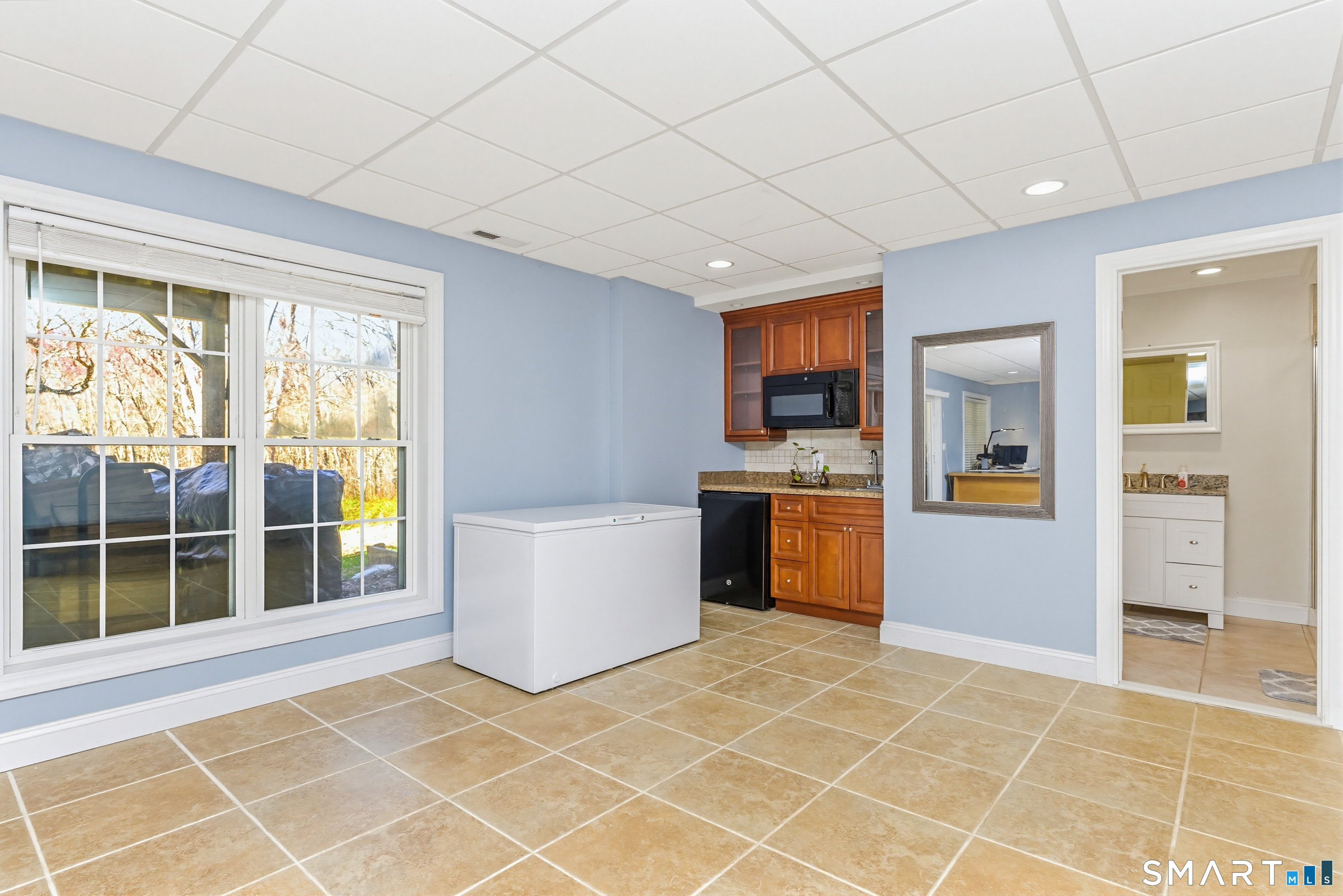 30 Block Farm Road Monroe, CT 06468 - Photo 32 of 40 a view of a kitchen with microwave and cabinets