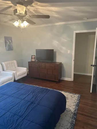 a view of entryway with wooden floor