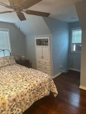 a bathroom with a shower toilet and sink