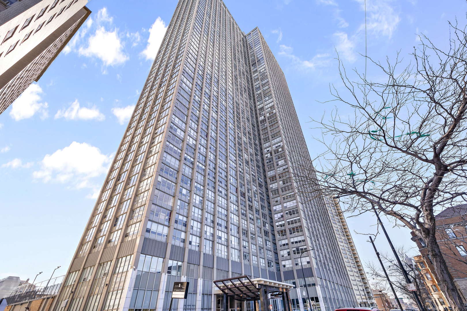 655 West Irving Park Road, Unit 4101 Chicago, IL 60613 - Photo 1 of 13 a view of a tall building