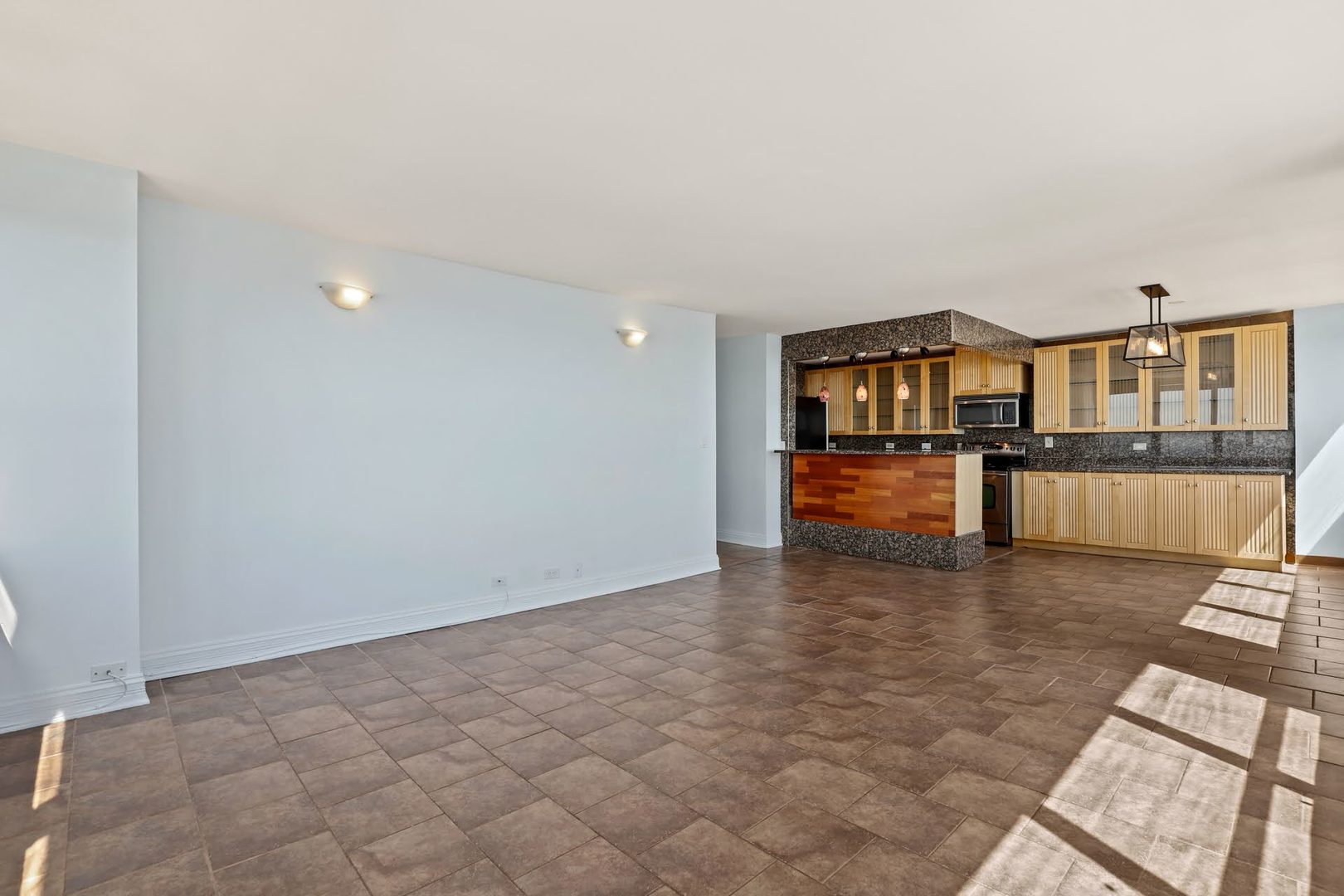 655 West Irving Park Road, Unit 4101 Chicago, IL 60613 - Photo 7 of 13 a view of a kitchen with a sink