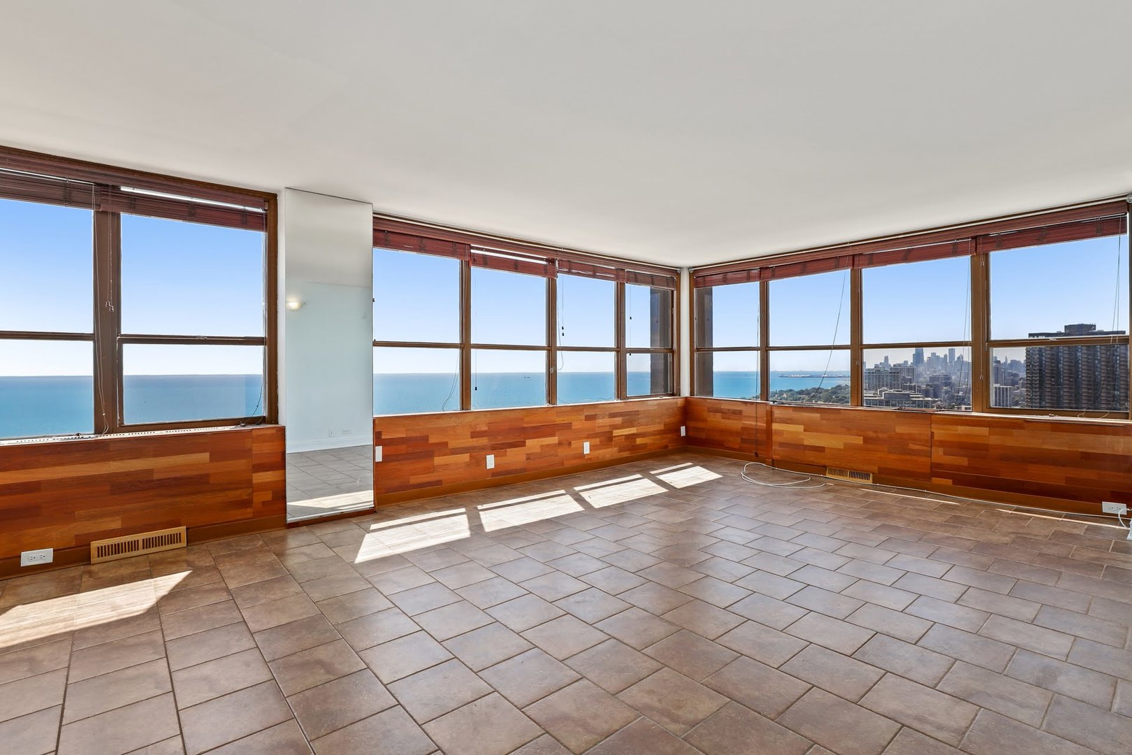 655 West Irving Park Road, Unit 4101 Chicago, IL 60613 - Photo 10 of 13 a bedroom with a bed and a large window