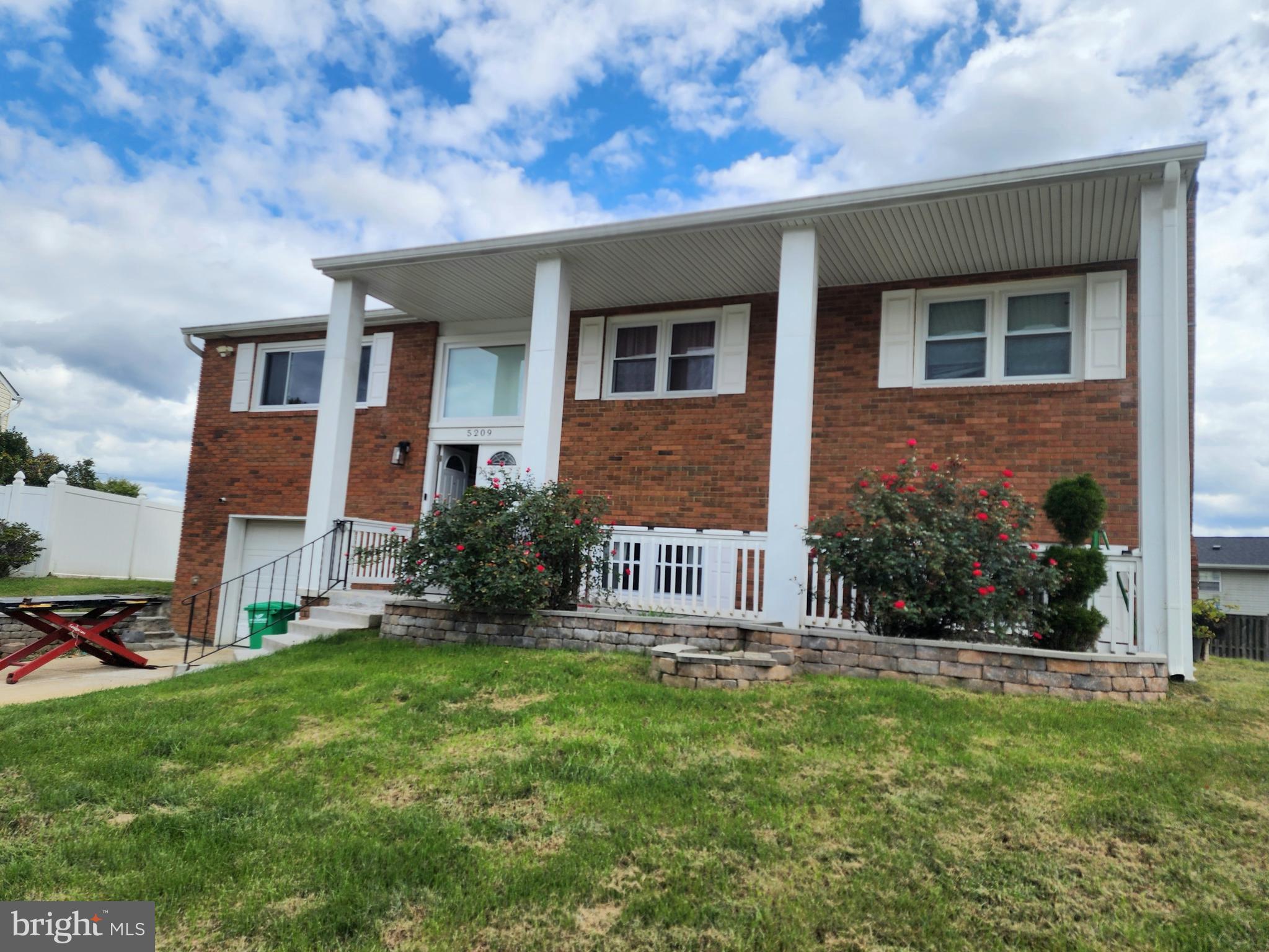 5209 Sumter Court Clinton, MD 20735 - Photo 21 of 24 front view of a house with a yard