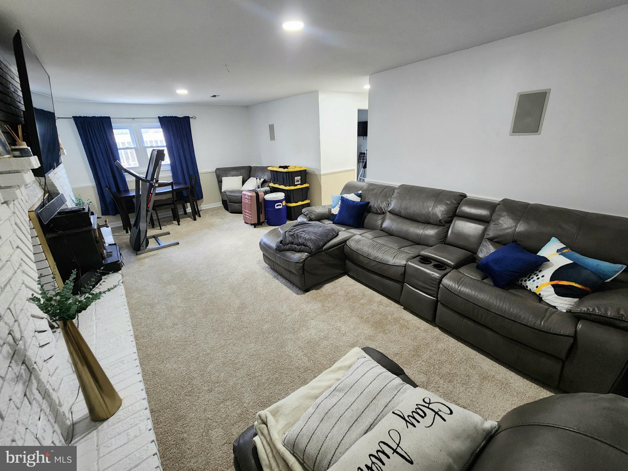 5209 Sumter Court Clinton, MD 20735 - Photo 5 of 24 a living room with furniture and a flat screen tv