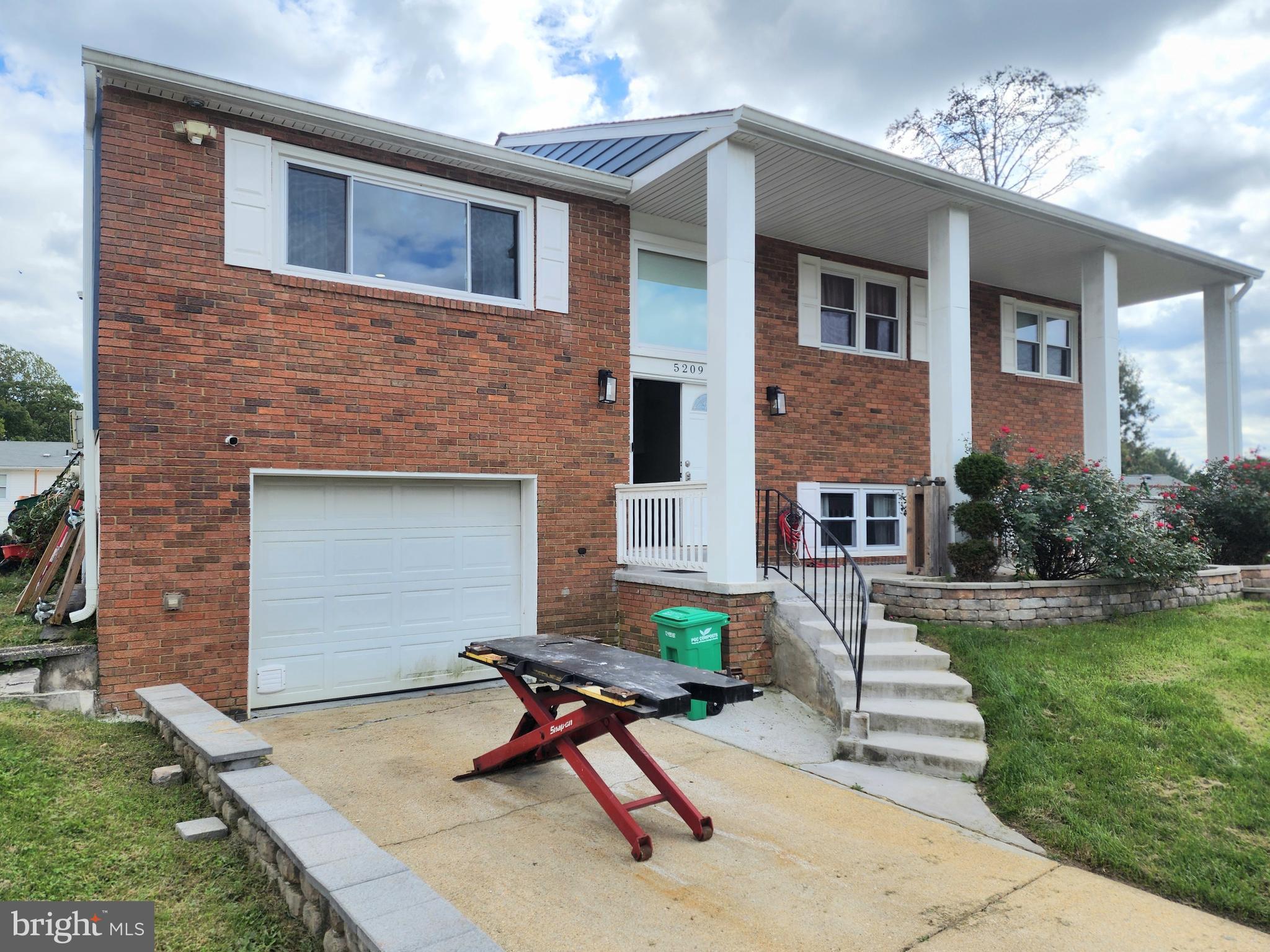 5209 Sumter Court Clinton, MD 20735 - Photo 6 of 25 a building outdoor space with patio furniture