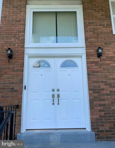 a hallway with a fireplace