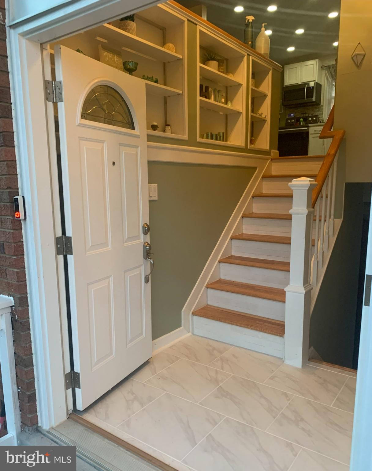 5209 Sumter Court Clinton, MD 20735 - Photo 8 of 25 a view of entryway and hall with wooden floor