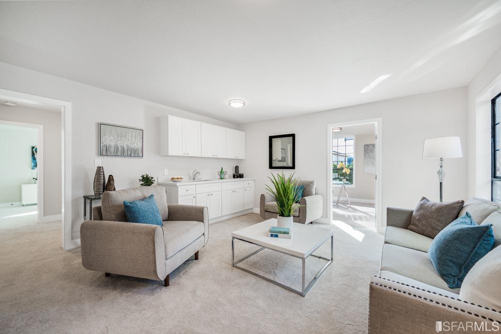 290 Clifton Road Pacifica, CA 94044 - Photo 31 of 60 a living room with furniture and a wooden floor