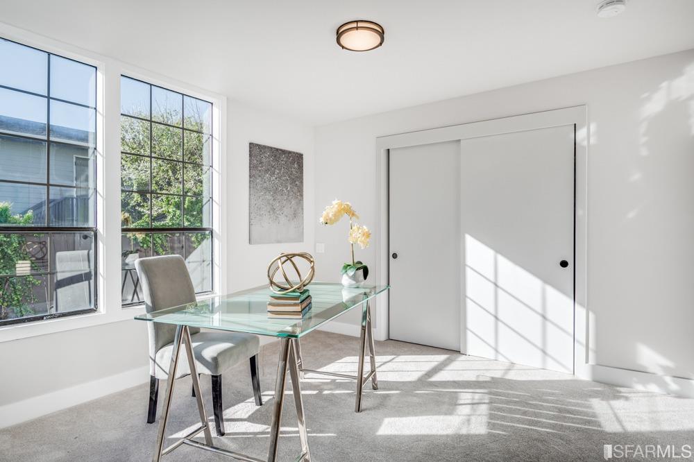 290 Clifton Road Pacifica, CA 94044 - Photo 39 of 60 a dining room with furniture and wooden floor