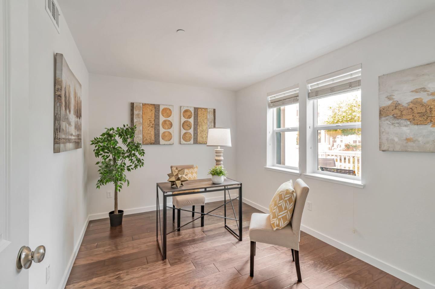 843 Avery Drive Mountain View, CA 94043 - Photo 19 of 43 a view of a livingroom with furniture and a potted plant