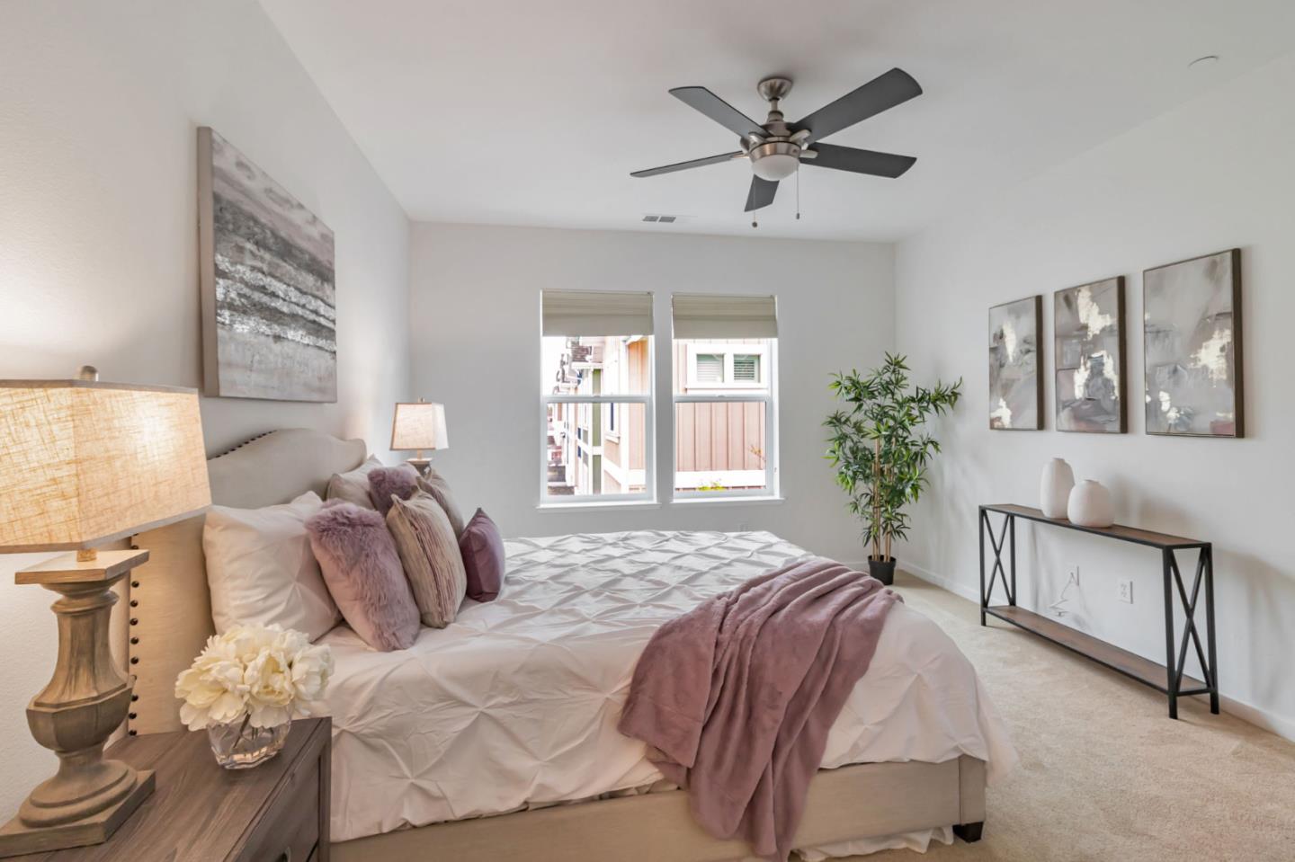 843 Avery Drive Mountain View, CA 94043 - Photo 24 of 43 a bedroom with a bed and a chandelier