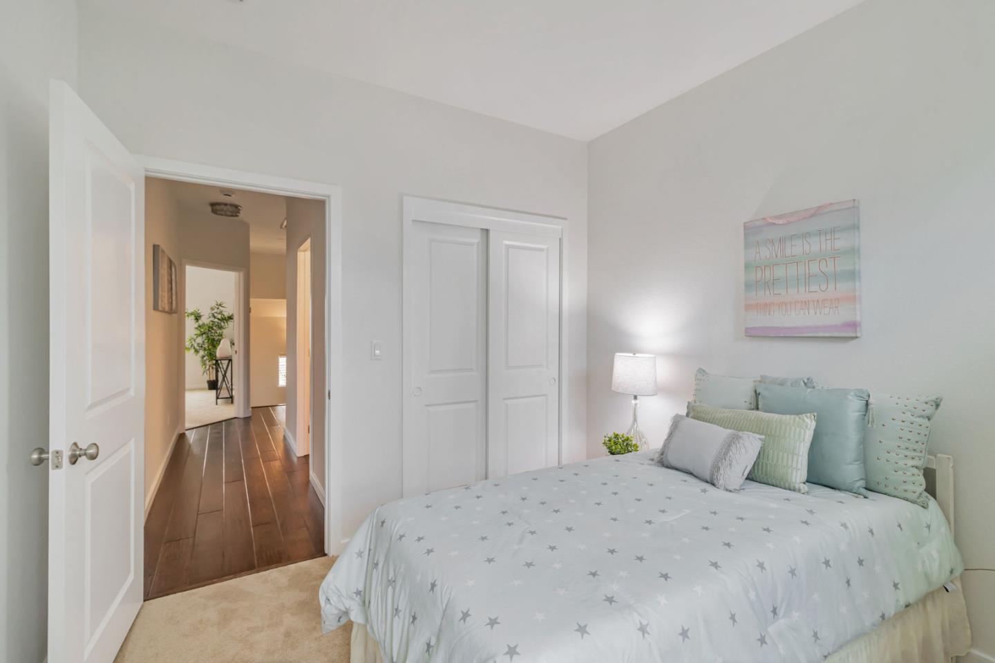 843 Avery Drive Mountain View, CA 94043 - Photo 25 of 43 a bedroom with a bed and wooden floor