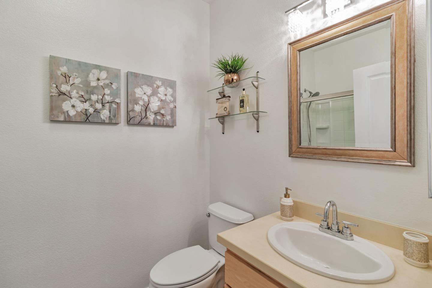 843 Avery Drive Mountain View, CA 94043 - Photo 32 of 43 a bathroom with a toilet sink and mirror