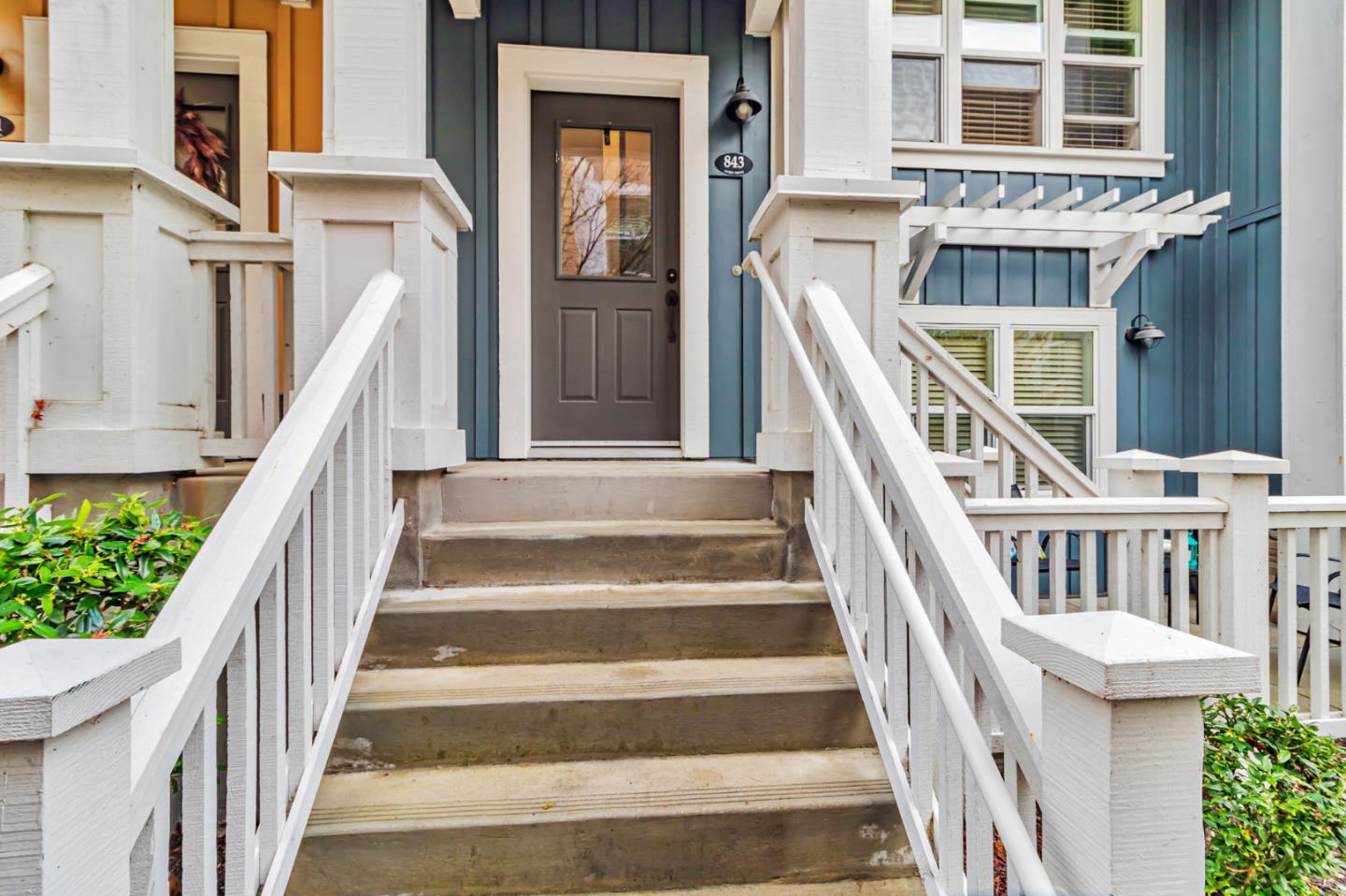 843 Avery Drive Mountain View, CA 94043 - Photo 7 of 43 a view of staircase with lots of frames on wall and a window