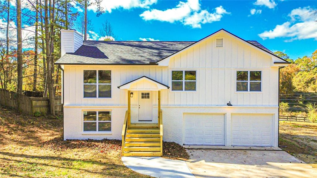4094 Dollar Circle Suwanee, GA 30024 - Photo 1 of 56 a front view of a house with a yard