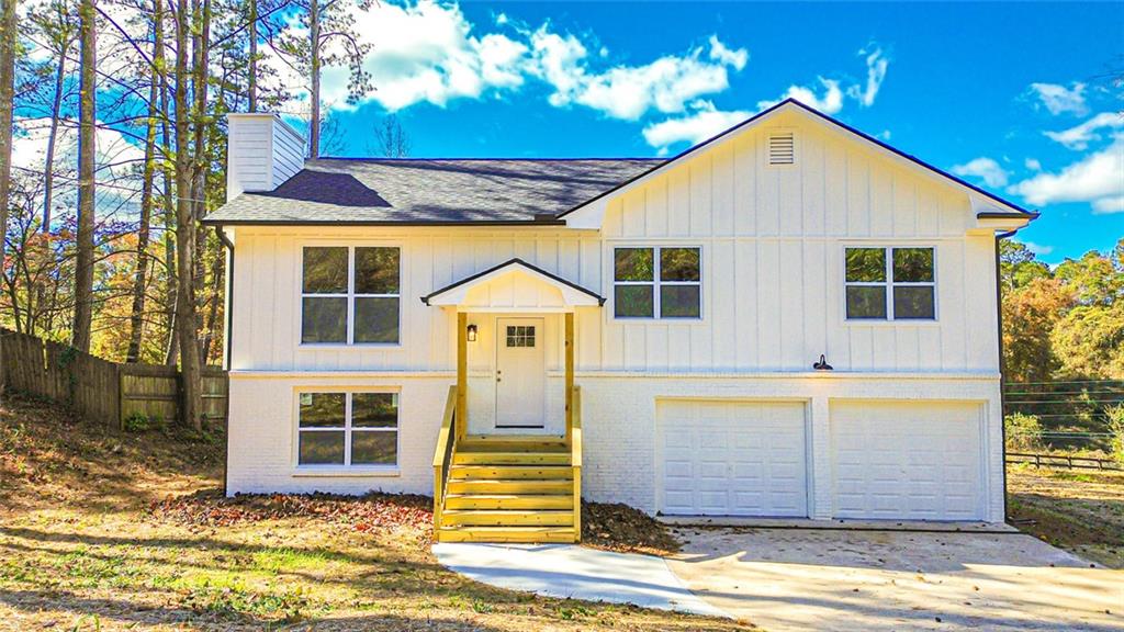 4094 Dollar Circle Suwanee, GA 30024 - Photo 2 of 56 a front view of a house with a yard