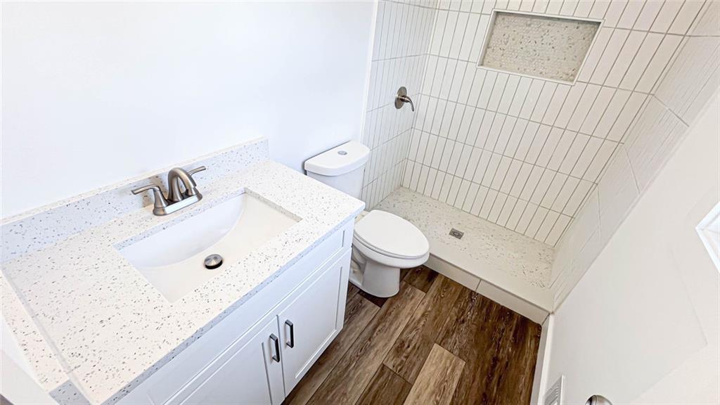 4094 Dollar Circle Suwanee, GA 30024 - Photo 34 of 56 a bathroom with a sink and a mirror