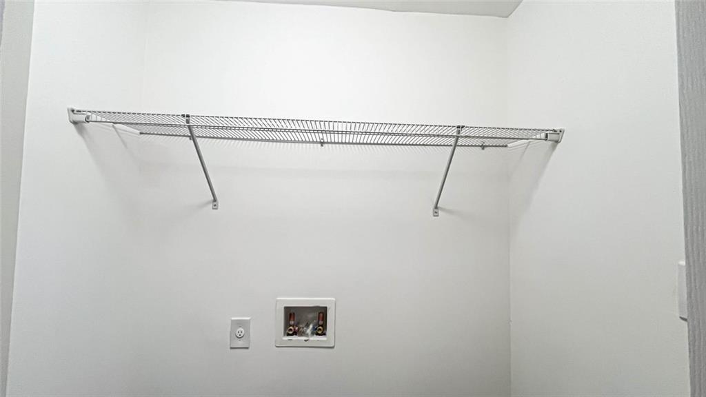 4094 Dollar Circle Suwanee, GA 30024 - Photo 42 of 56 a view of a room with racks on the wall