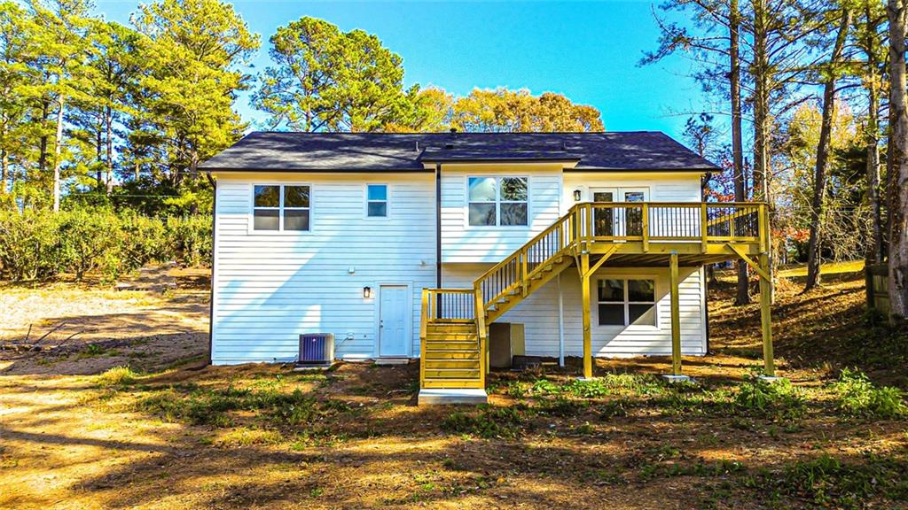 4094 Dollar Circle Suwanee, GA 30024 - Photo 8 of 56 a view of a house with a yard