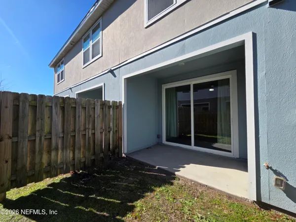 a view of a hallway with stairs
