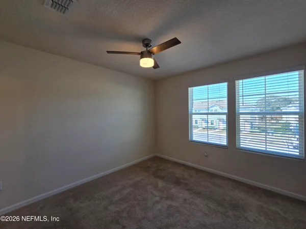 a view of a room with an empty space