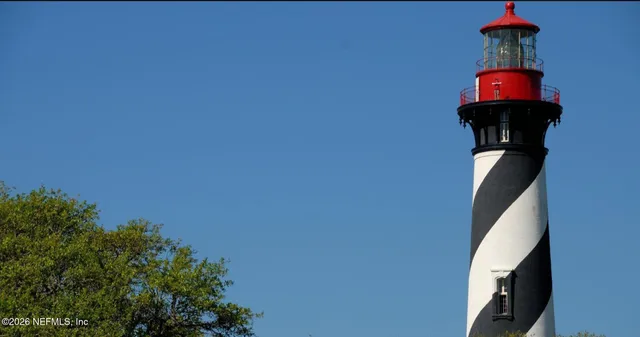 a front view of building with yard