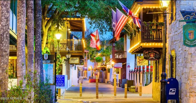 a view of a lake with a yard