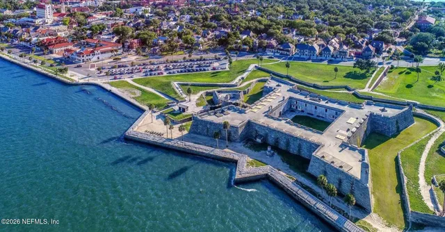 a view of a golf course with a big yard