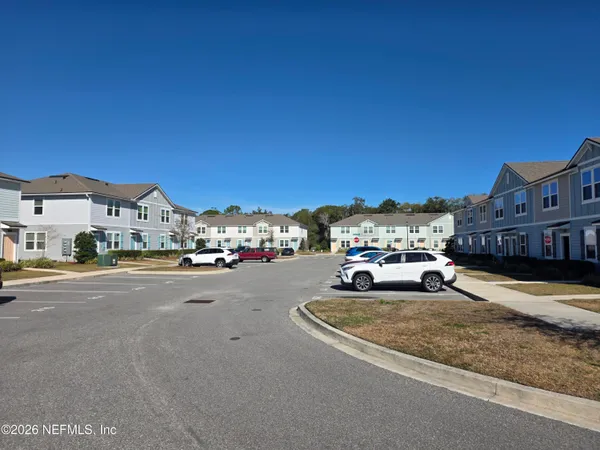 a view of a house with backyard