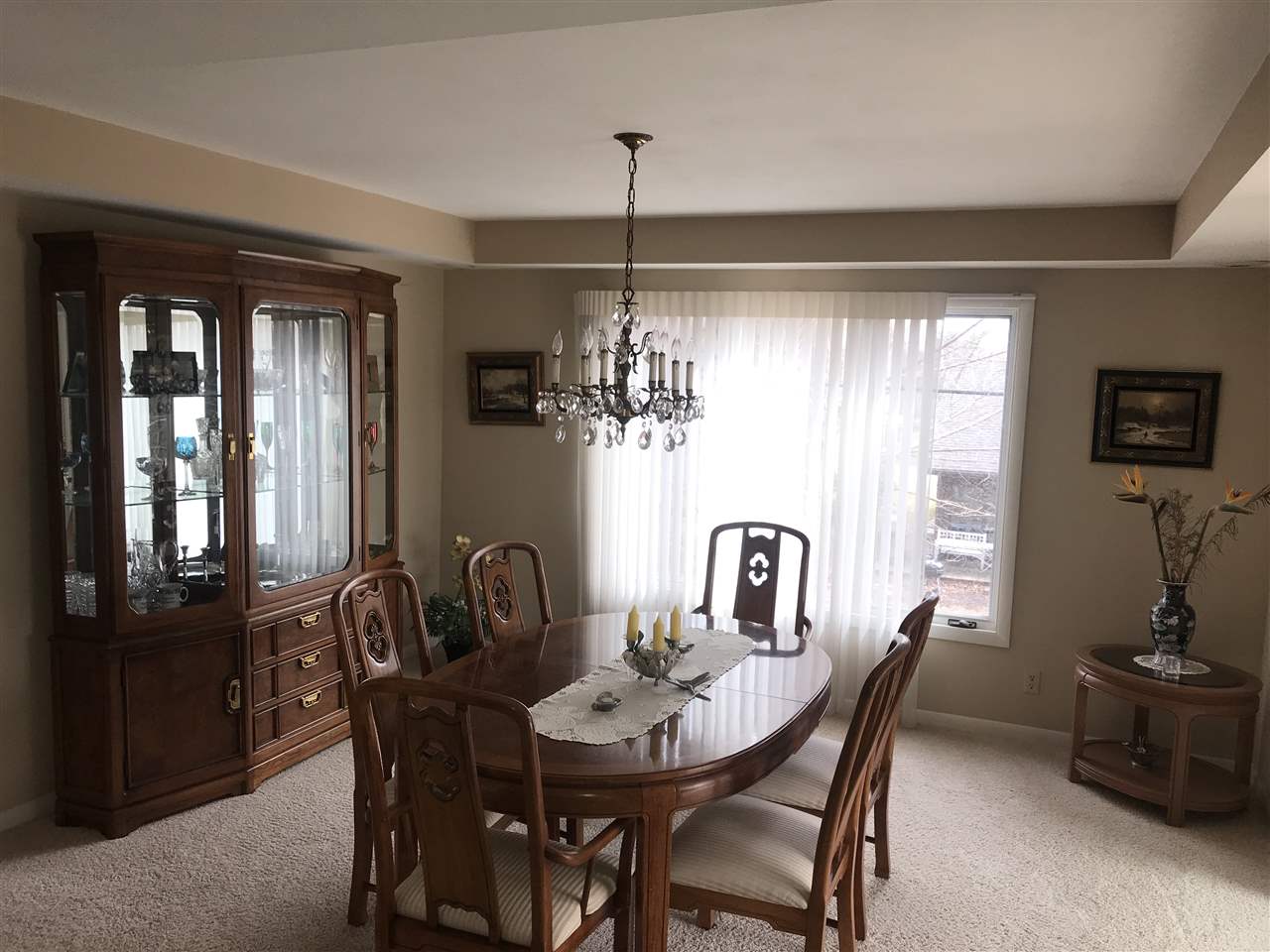 720 Roxbury Road Rockford, IL 61107 - Photo 5 of 18 a view of a dining room with furniture window and outside view