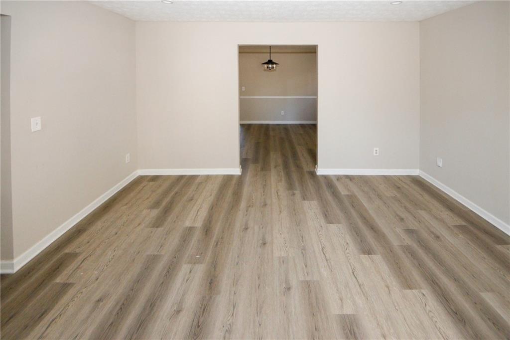 4493 Bridle Ridge Way Lithonia, GA 30038 - Photo 17 of 35 a view of wooden floor in a room