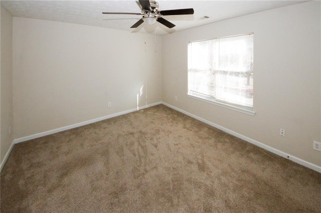 4493 Bridle Ridge Way Lithonia, GA 30038 - Photo 28 of 35 an empty room with a window