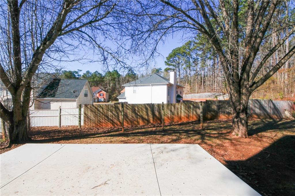 4493 Bridle Ridge Way Lithonia, GA 30038 - Photo 35 of 35 a view of a backyard with a tree