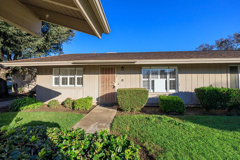 617 West Granger Avenue, Unit 17 Modesto, CA 95350 - Photo 1 of 24 a front view of a house with garden