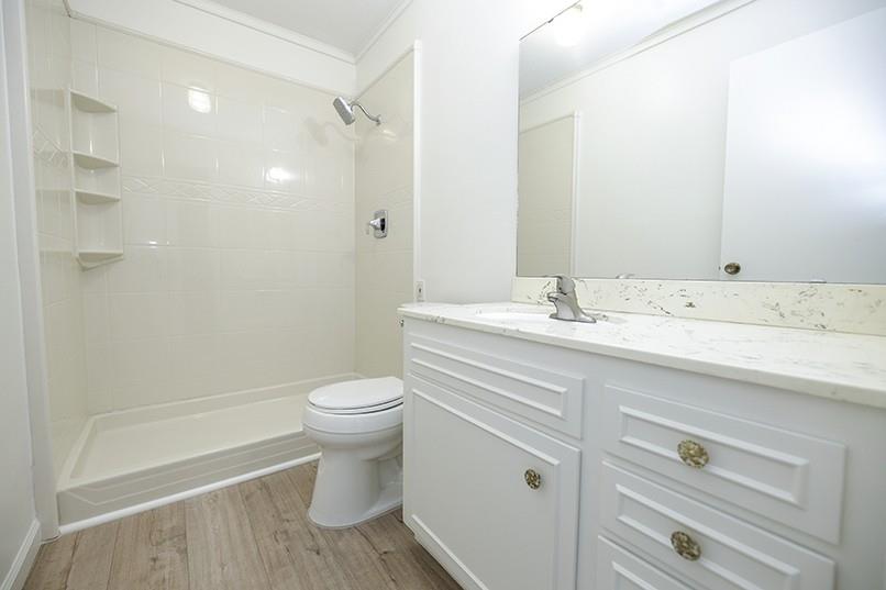 617 West Granger Avenue, Unit 17 Modesto, CA 95350 - Photo 19 of 24 a bathroom with a sink a toilet and shower