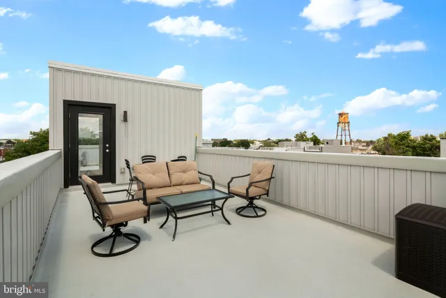 a building outdoor space with patio furniture