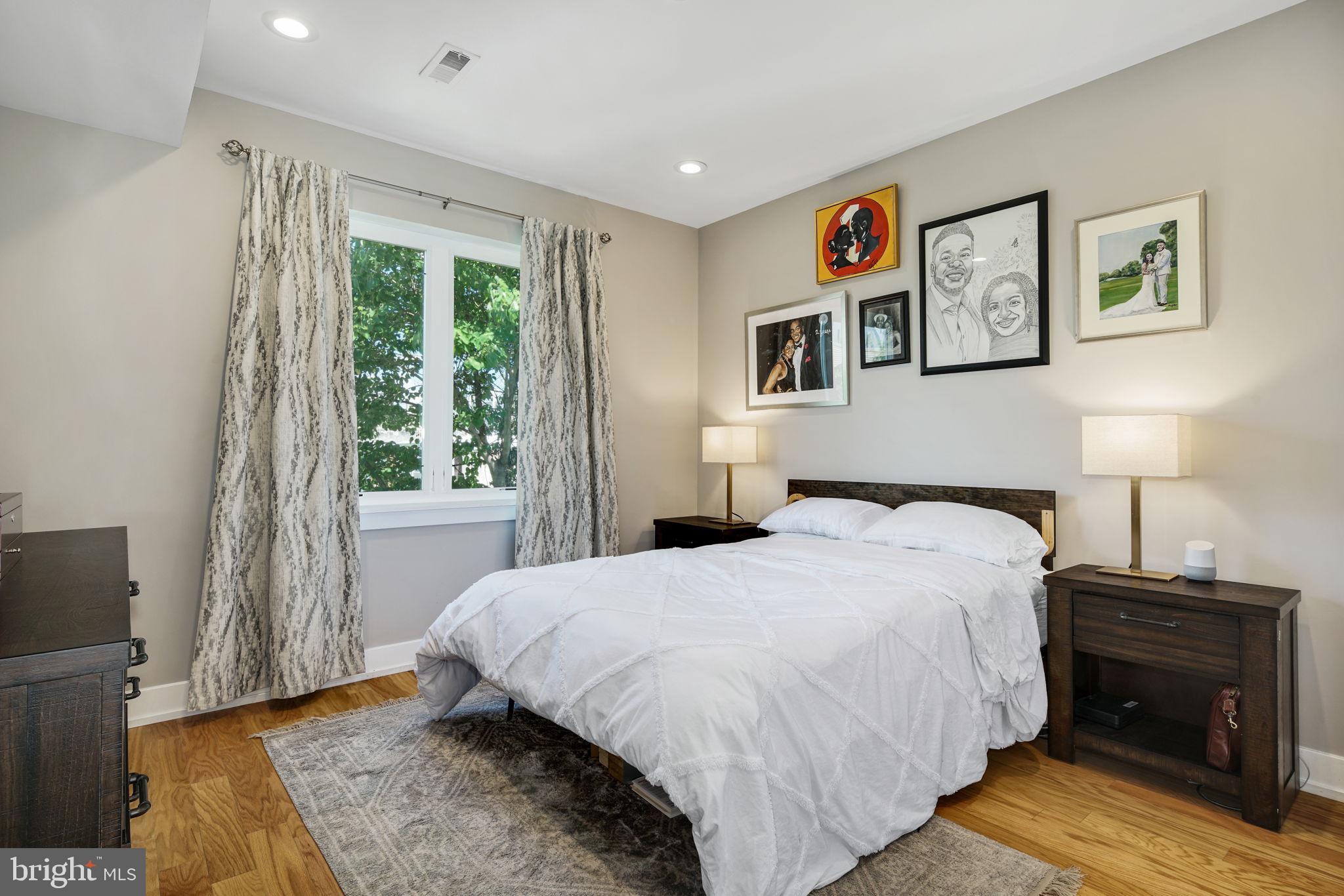 2711 West Jefferson Street, Unit 2 Philadelphia, PA 19121 - Photo 10 of 27 a bedroom with a bed and a window