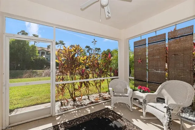 a bathroom with a mirror and a glass door shower