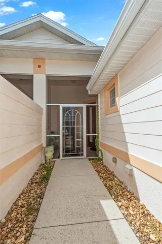 a kitchen with stainless steel appliances a refrigerator and a stove top oven