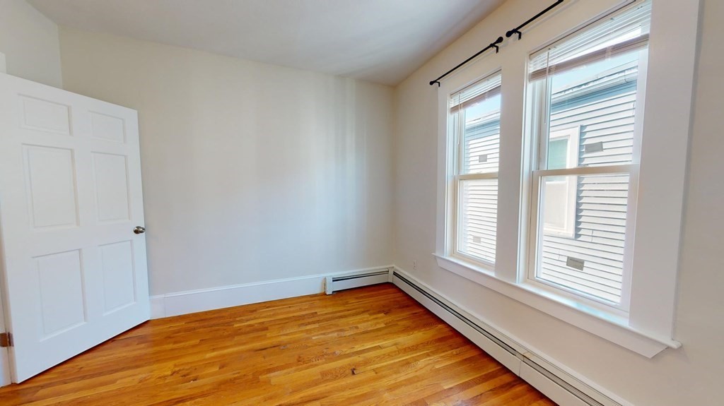 11 Elder Street, Unit 3 Boston, MA 02125 - Photo 21 of 26 a view of a room with a large window