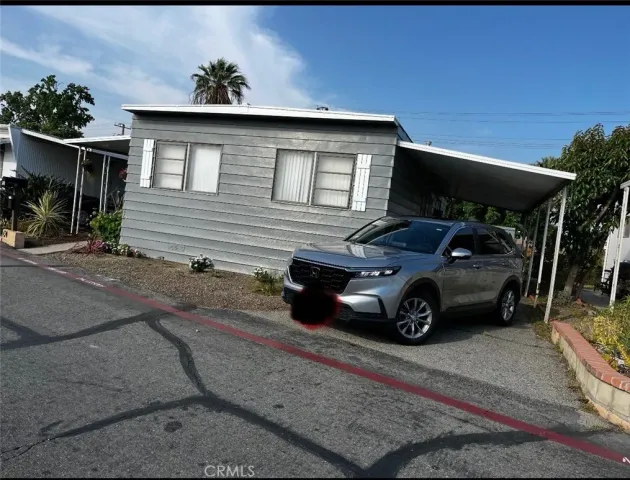 a car parked in front of a house