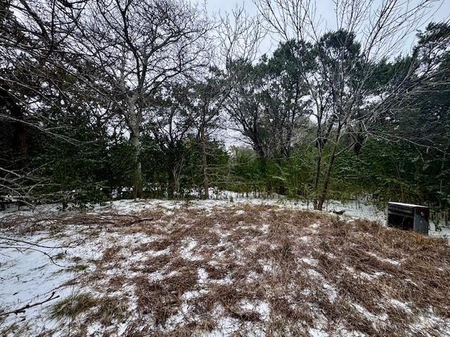 a fire hydrant in the middle of a field