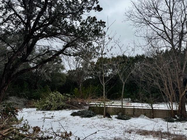 262 Palomino Loop Whitney, TX 76692 - Photo 14 of 16 a backyard of a house with lots of green space