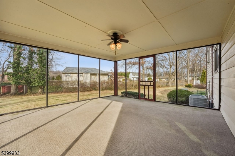 35 South Derby Road Springfield, NJ 07081 - Photo 17 of 30 a view of a room with sliding windows