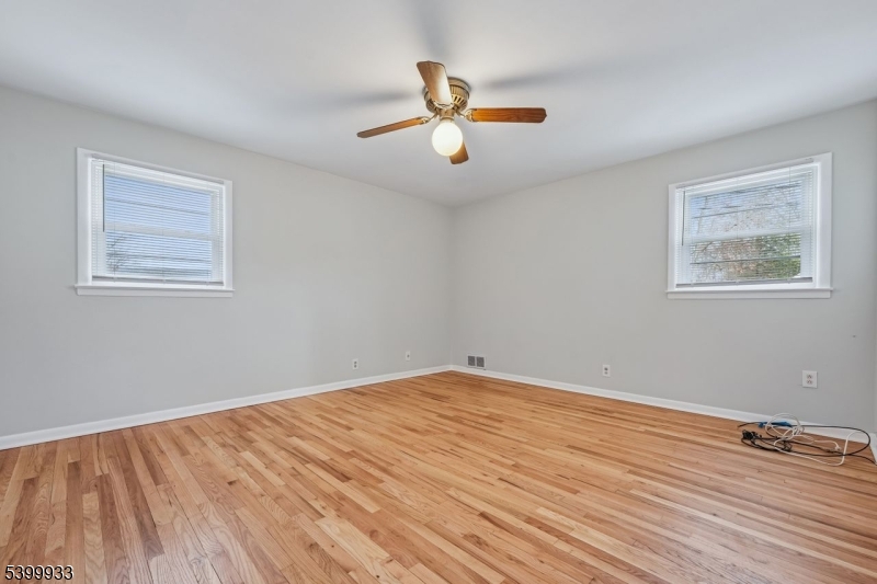 35 South Derby Road Springfield, NJ 07081 - Photo 21 of 30 a view of empty room with wooden floor