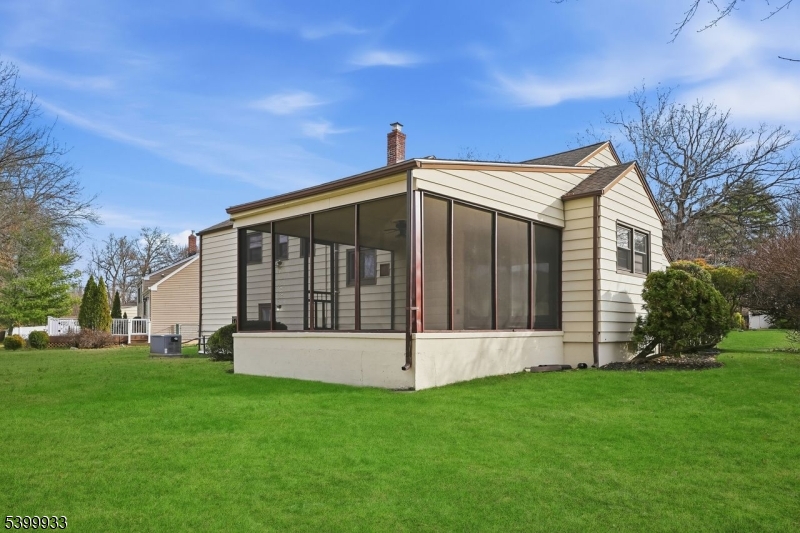 35 South Derby Road Springfield, NJ 07081 - Photo 5 of 30 a view of a house with a yard